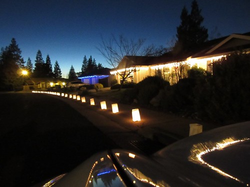 luminarias outside one-story houses in Riverside and Avondale