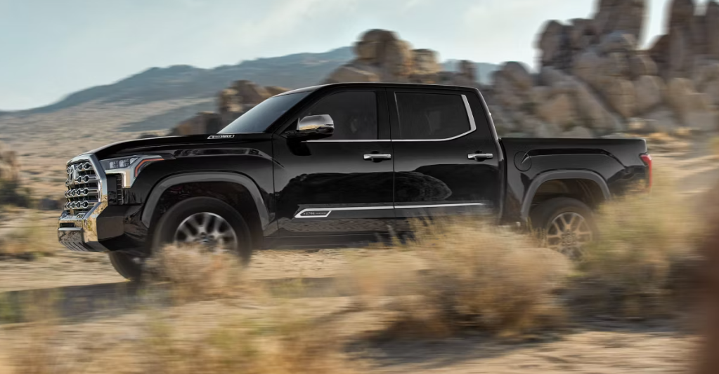 2026 Toyota Tundra in Black driving through sand